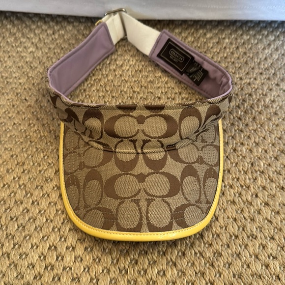 Coach visor in signature fabric with yellow patent leather around the rim. - Picture 1 of 4